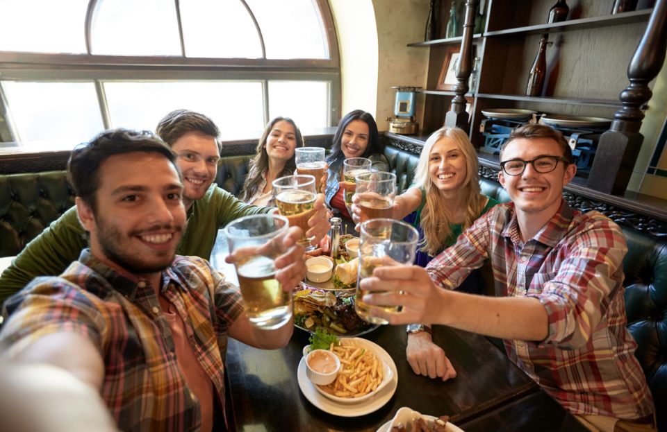 People enjoying drinks and food